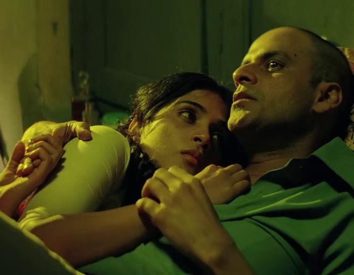 Richa Chadha and Manoj Bajpeyi in Gangs of Wasseypur (2012)